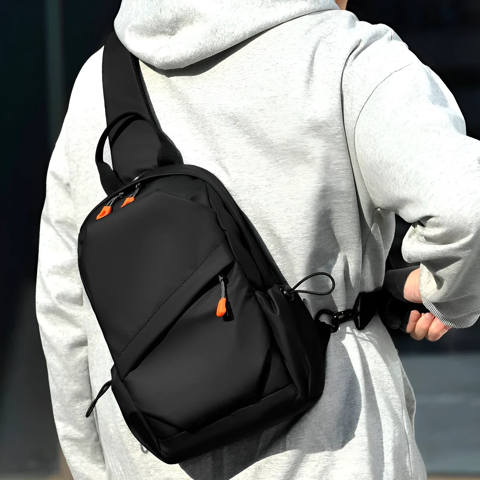 Mens casual single shoulder crossbody bag in polyester material, shown in black and grey colour options