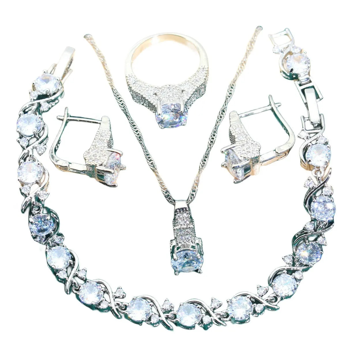 Bridal zircon jewellery set showing necklace, earrings, bracelet, and ring pieces with water wave chain design