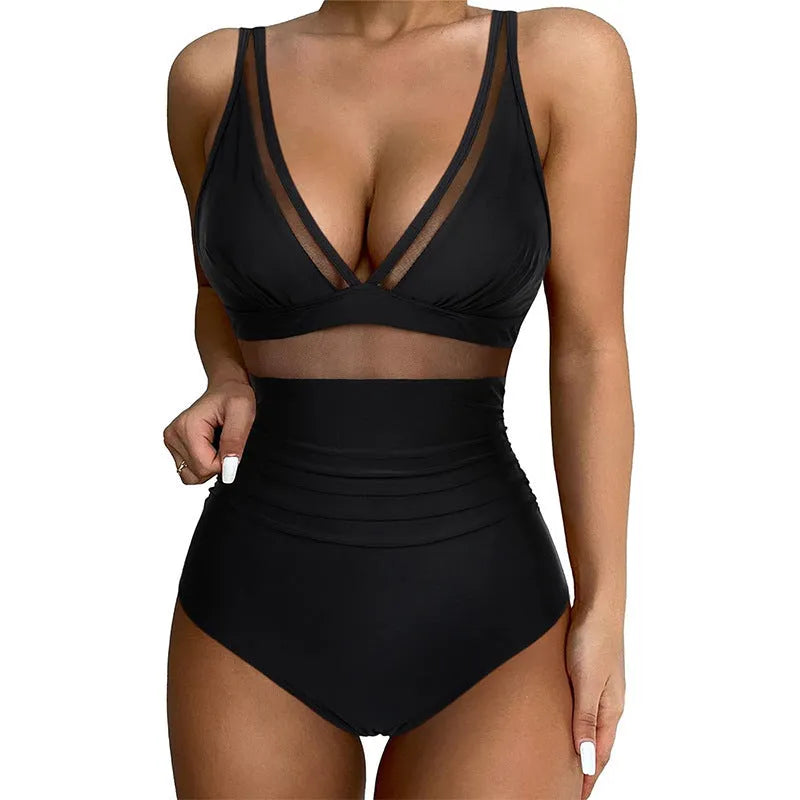 Black sleeveless one-piece swimsuit with halter neck for women.