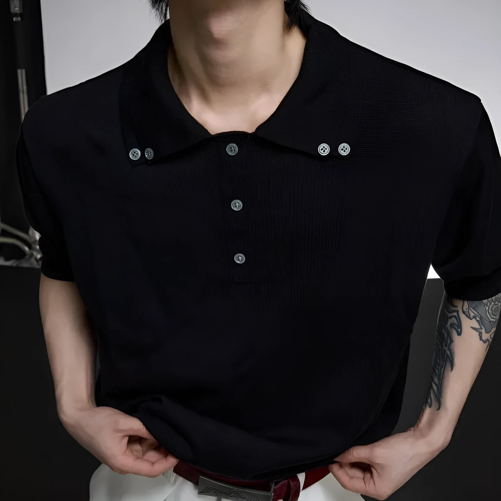 Men's black knitted polo shirt with double collar design and short sleeves