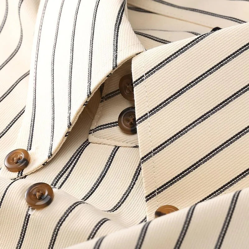 Coffee coloured striped men's long-sleeved shirt with a slim fit on a hanger.
