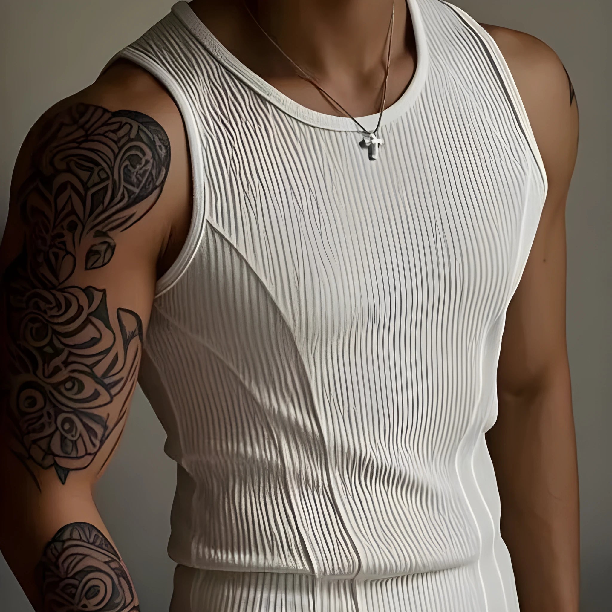 Black men's tight-fitting polyester sports vest tank top on a mannequin, front view.