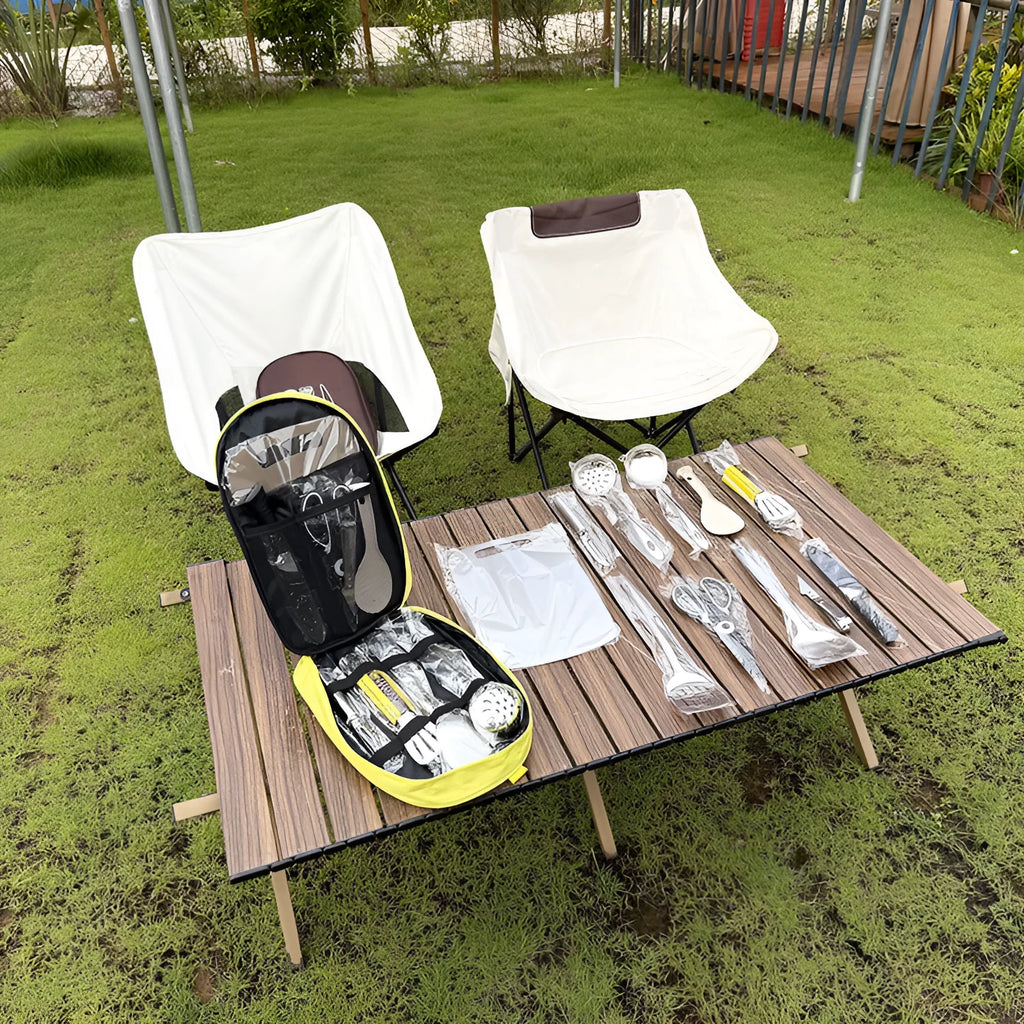 12-piece stainless steel picnic kitchenware set with khaki storage bag open to show utensils