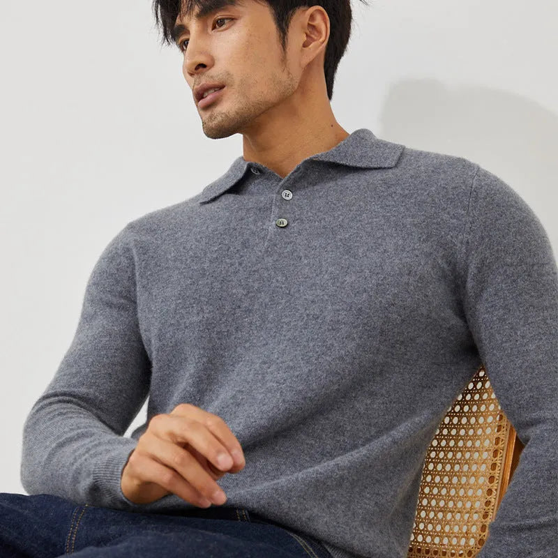 Man wearing a sapphire blue cashmere pullover sweater with a polo collar.