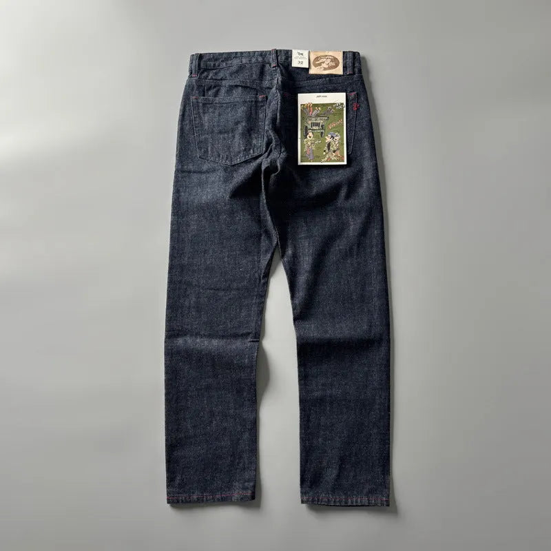 Men's straight leg denim jeans in a primary colour, showing front view of the mid waist and classic cut.