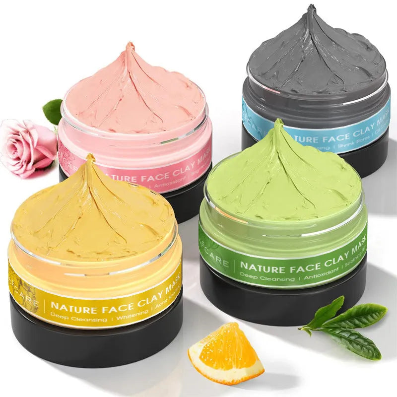 Set of four Dead Sea mud, green tea, turmeric, and rose clay facial mask packets, 80ml each.