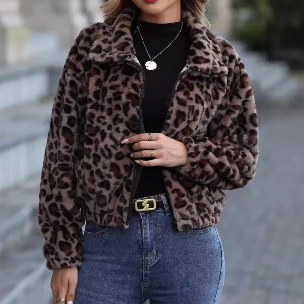 Women's loose leopard print plush coat with zipper front and raglan sleeves.