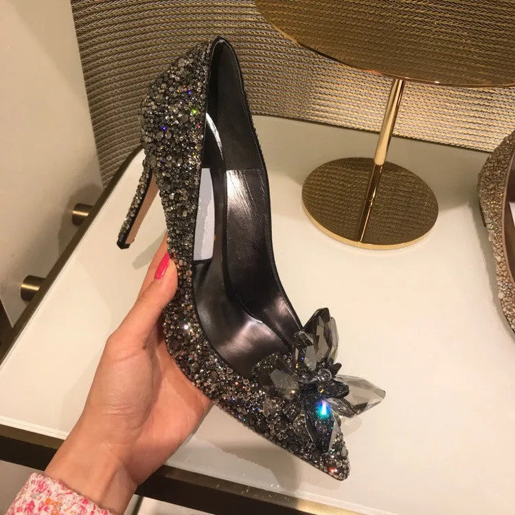 Women's gold stiletto heels with rhinestone decoration and pointed toe
