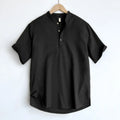 Men's solid colour linen blend short sleeve t-shirt on a hanger.
