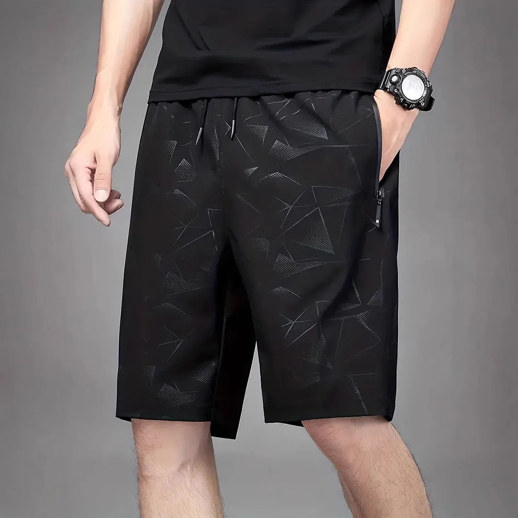 Men's loose black sports shorts with printed design for casual athletic wear and beach activities