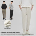 Men's slim-fit ankle length trousers in solid colour with zipper fly, anti-wrinkle polyester twill fabric