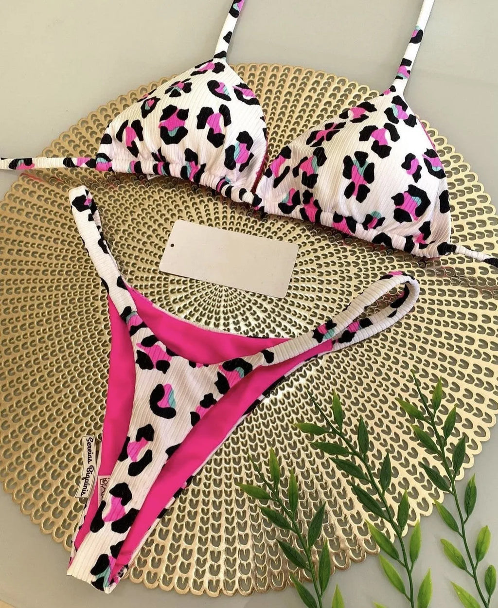 Women's printed bikini swimsuit in briefs style with cotton lining, shown in colour RT2110