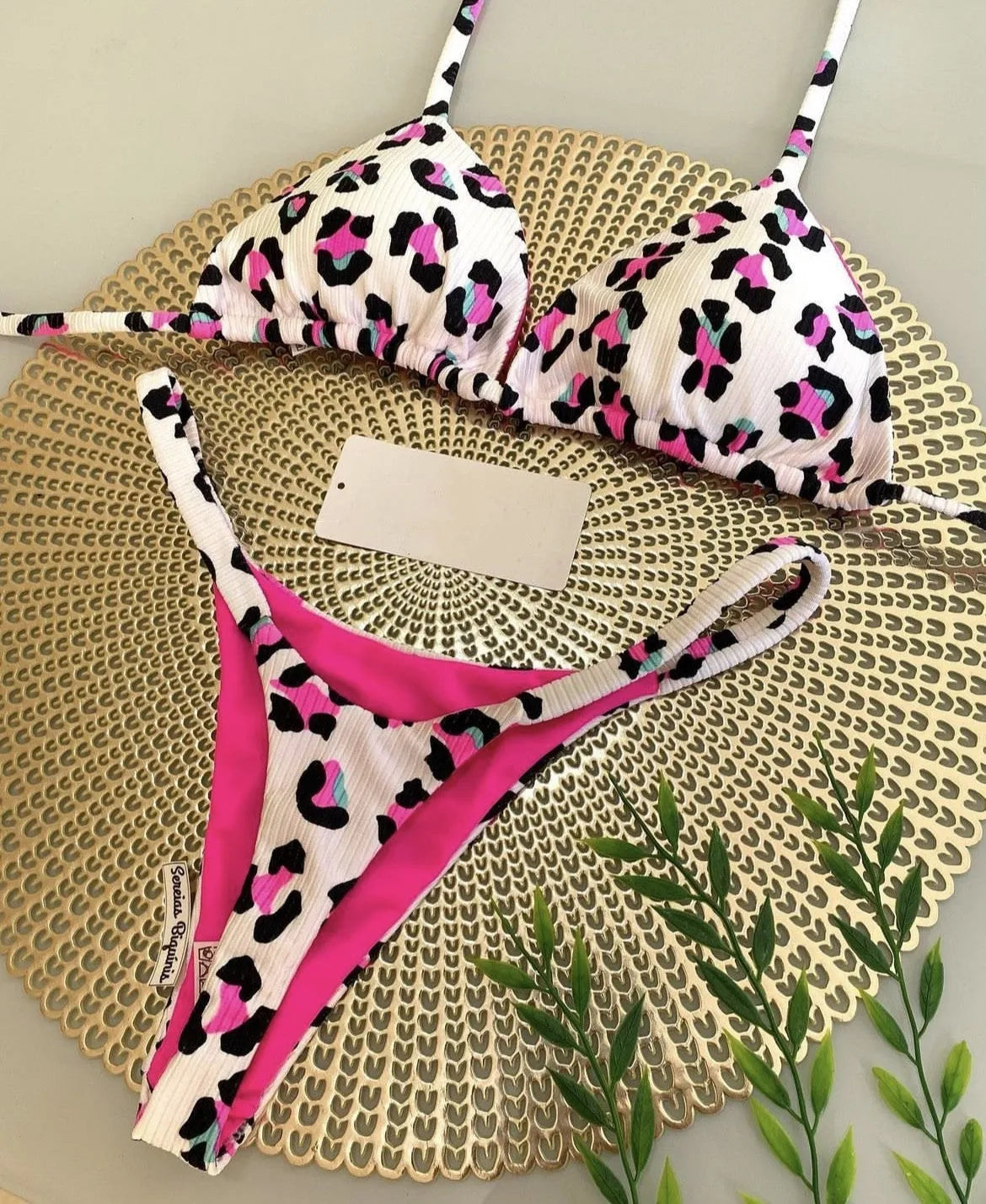 Women's printed bikini swimsuit in briefs style with cotton lining, shown in colour RT2110
