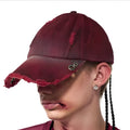 Rose red cotton peaked cap with curved brim and adjustable strap