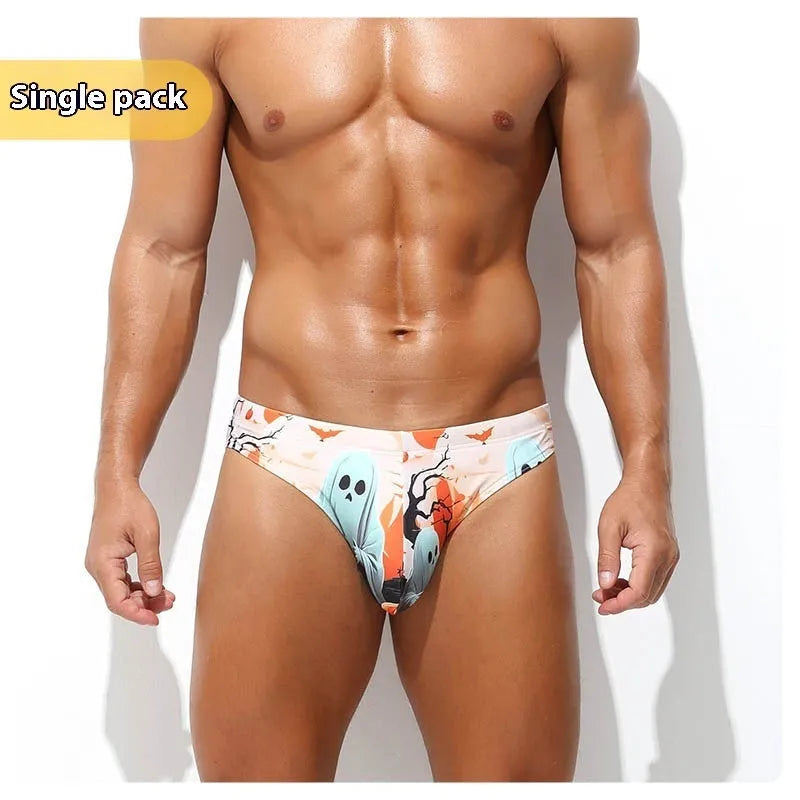 Men's quick-drying digital print shorts in polyester fabric showing low waisted briefs style