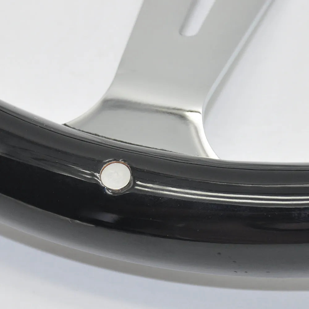 Black classic car steering wheel made from peach wood with a bright electroplated finish, showing six-hole bolt pattern.