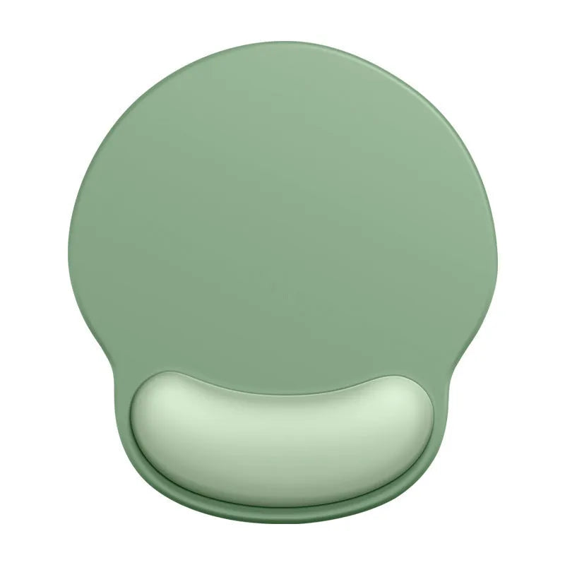 Silicone wristband mouse mat in a gradient colour on a desk