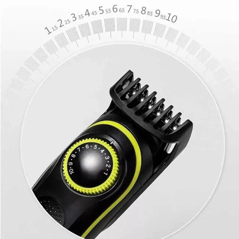 Black KM-696 rechargeable electric hair clipper set with USB cable and cleaning brush.