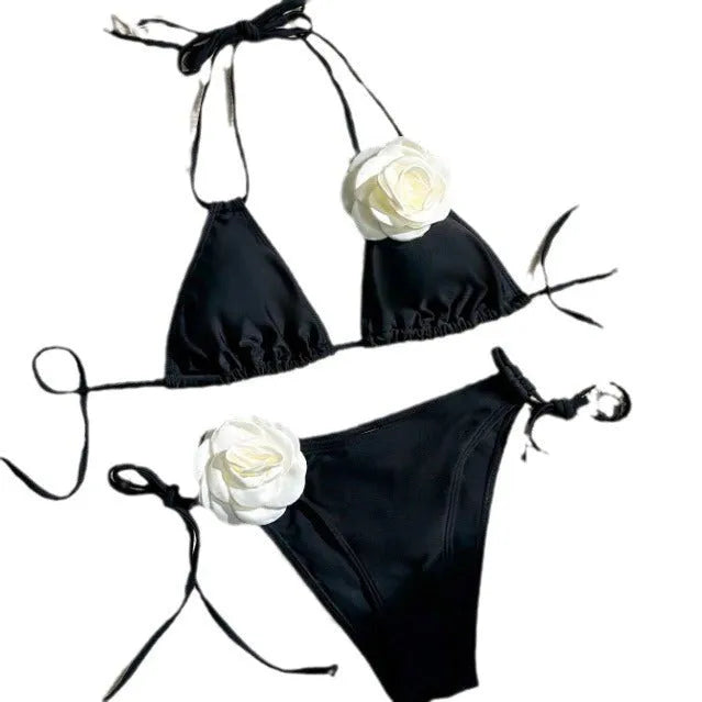 Black women's bikini swimsuit with 3D flower lace detailing and backless split design