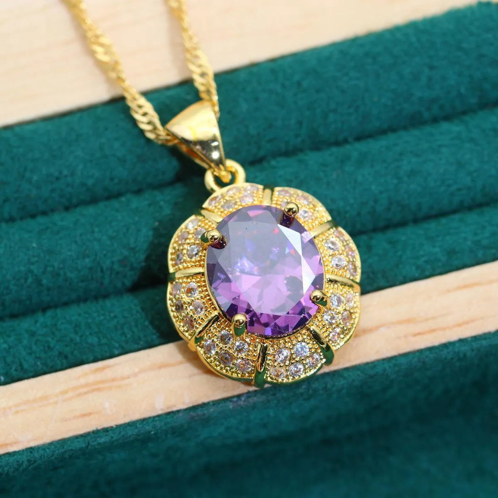 Gold plated jewellery set with multi-colour zircon stones, showing necklace, earrings, bracelet, and ring.