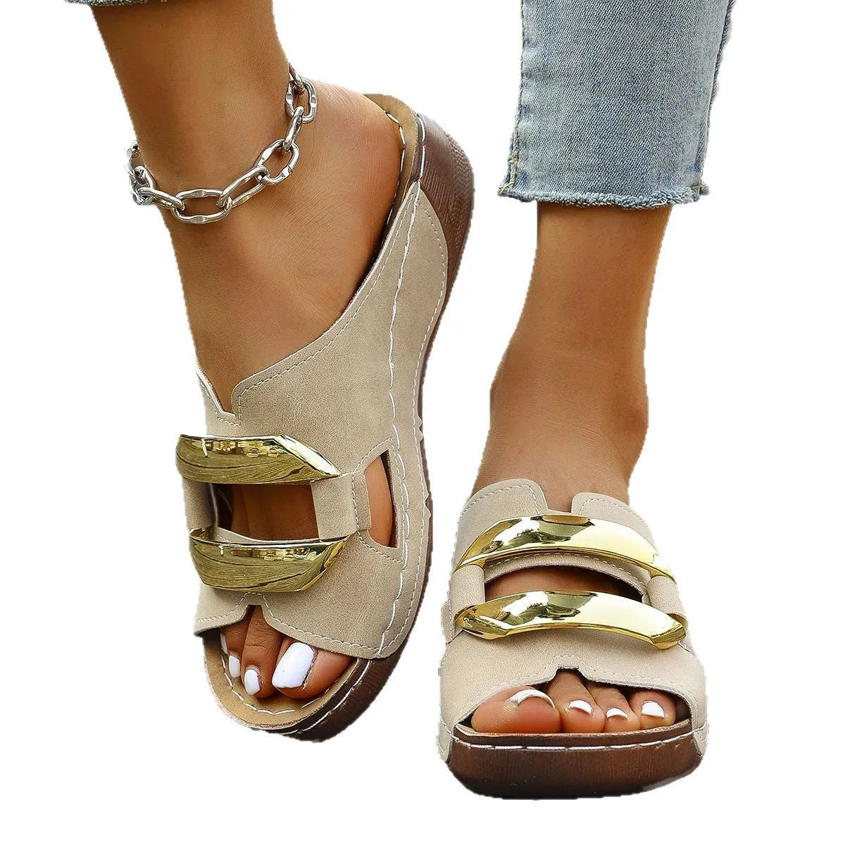 Roman style platform sandals in black with metal details and a rubber sole.