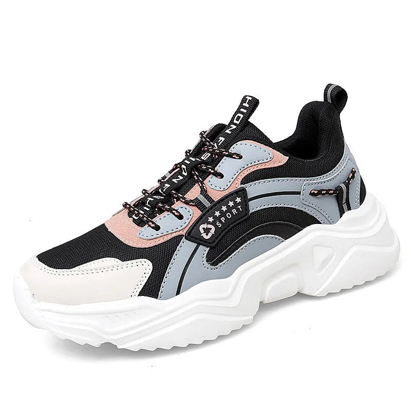 Women's white casual sports shoes with mesh upper, thick PU sole, and buckle detail