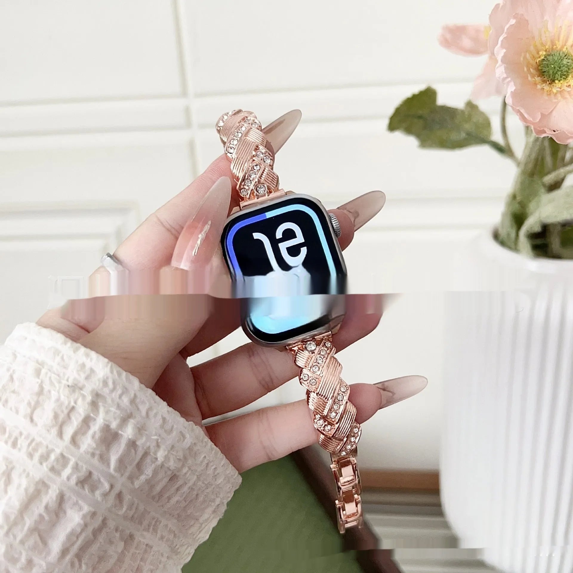 Zinc alloy metal watch strap for iPhone in silver, rose gold, gold, black, and starlight colour options on a grey background.
