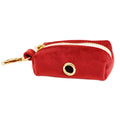 Cloth dog collar, matching leash, vest, bow tie, and poop bag holder set laid out flat.