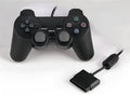 PS2 wired game controller with USB cable, shown in bare metal colour finish