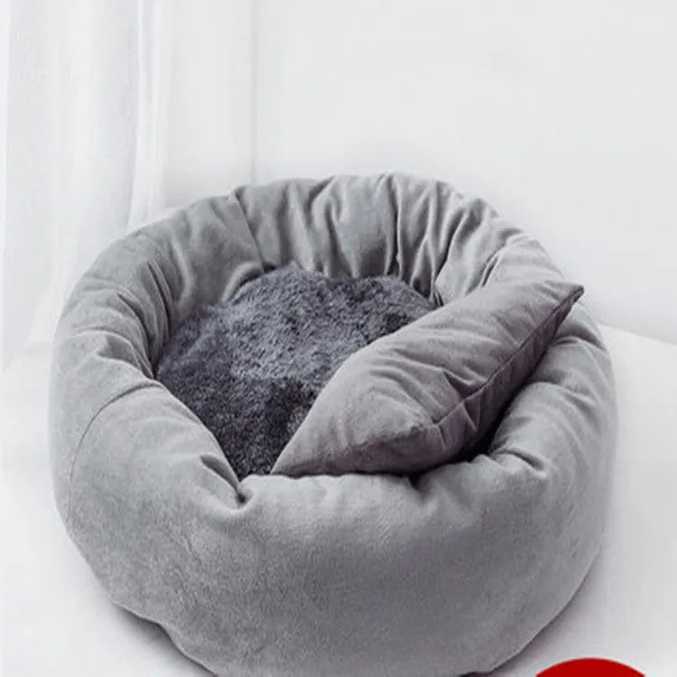 Cloth dog bed with PP cotton filling in light grey or pink colours, available in five sizes with optional pillow