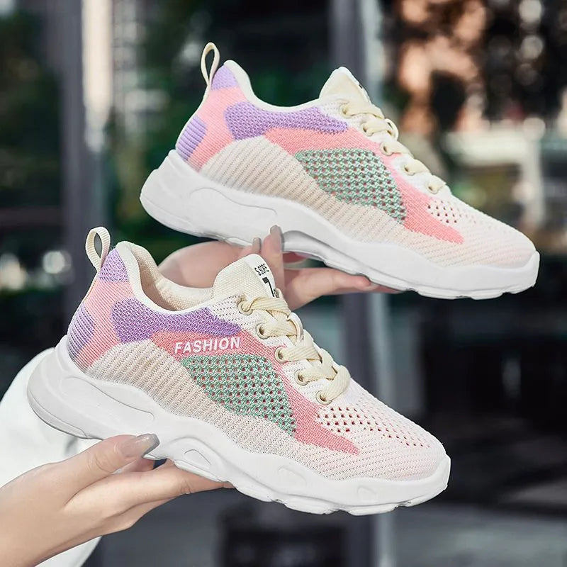 Casual colourblock lace-up sneakers for women with blue mesh upper, round toe, and white sole on a light background