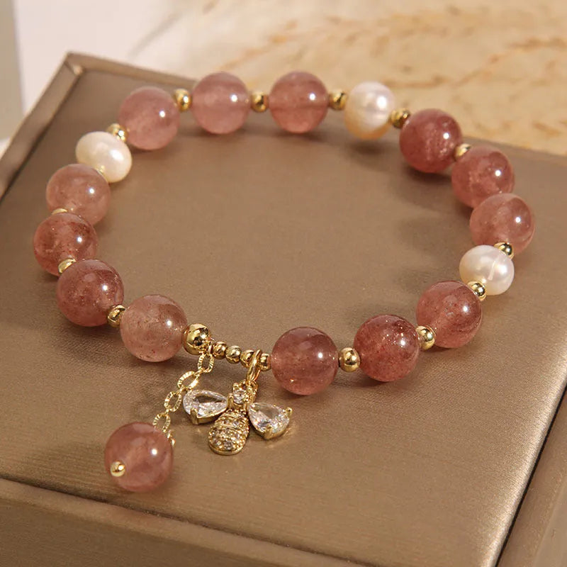 Women's strawberry quartz and freshwater pearl bracelet with zircon details in alloy setting
