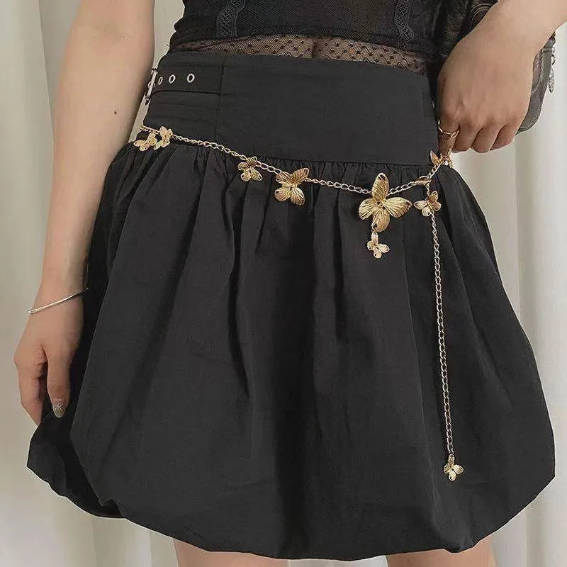 Gold or silver alloy butterfly waist chain measuring 104cm length with 40cm width decorative motif