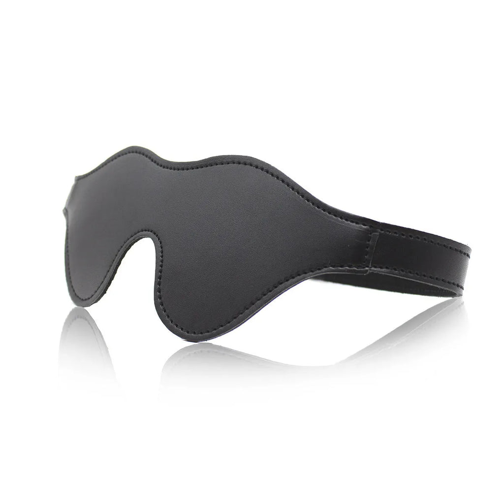 Women's leather eye mask with Velcro strap in black colour showing three-dimensional design