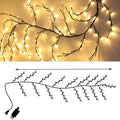 Warm white LED rattan tree light for indoor room and wall decoration.
