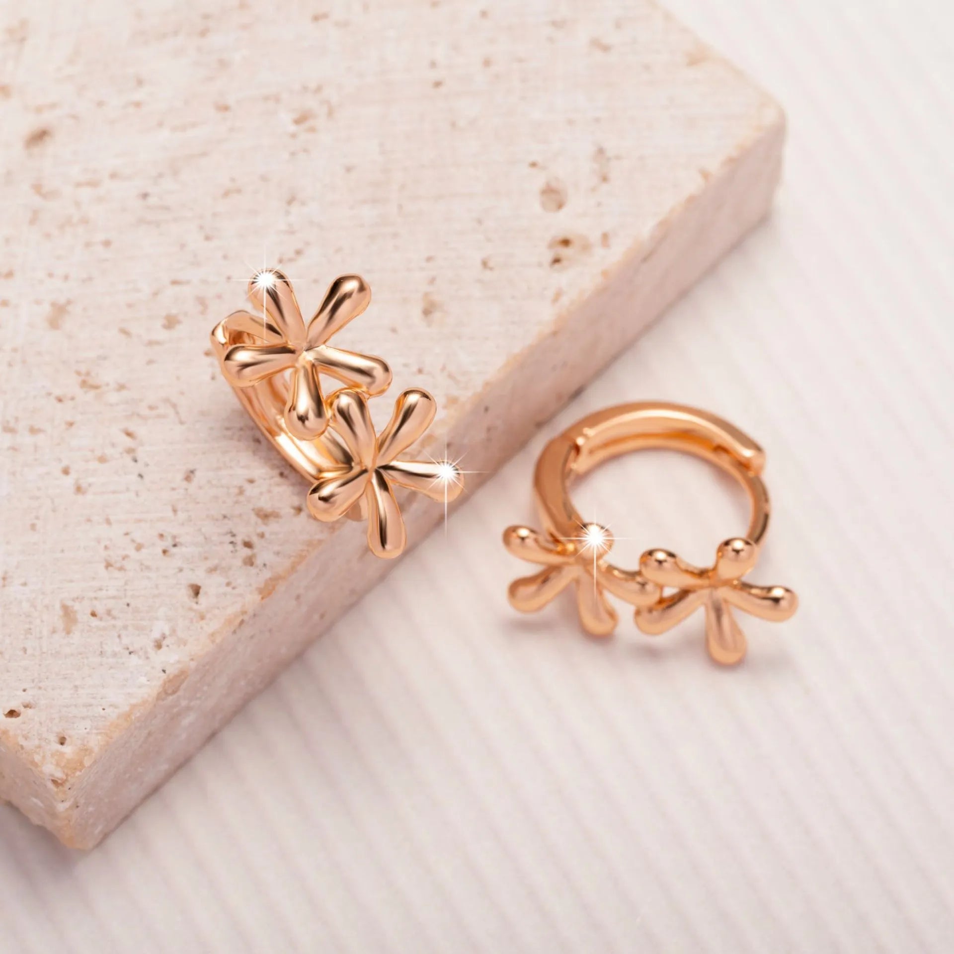 Rose gold electroplated waterdrop flower earrings with circular design for women