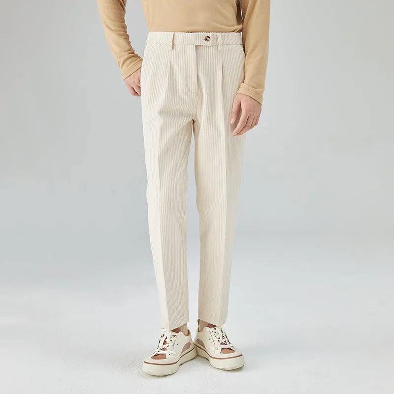 Men's straight-leg corduroy trousers in beige colour showing micro-elastic fabric and mid-waist design