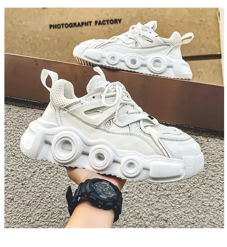 Men's low-top casual sneakers with mesh upper and thick rubber sole in black, grey, or white.