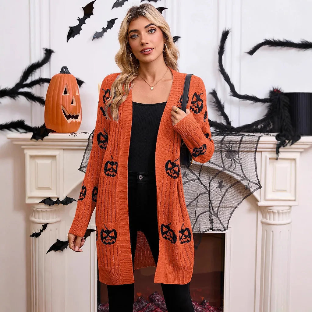 Women's black Halloween cardigan with orange pumpkin head jacquard knitting.