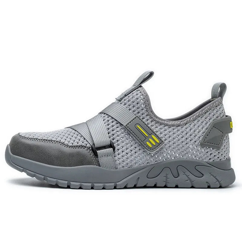 Men's grey anti-smash and anti-puncture insulation safety work shoe with a woven upper and rubber sole.