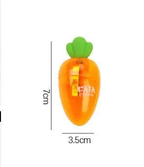Carrot-shaped plastic manual pencil sharpener with extended handle on a white background.