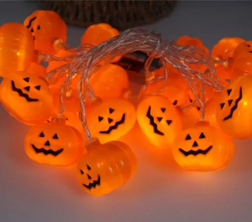 Halloween LED string lights with pumpkin, ghost, and bat decorations on a 1.2m white wire.
