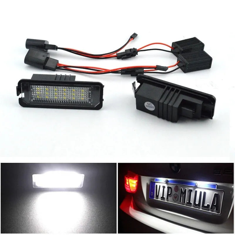 Two white LED licence plate light bulbs for Volkswagen Golf, Polo, and Phaeton models.