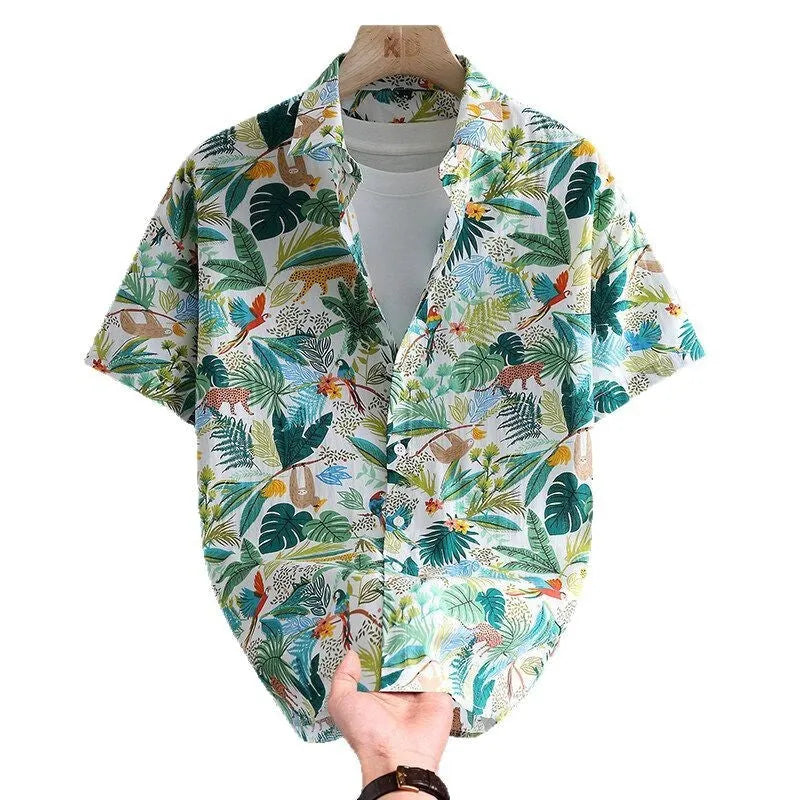 Man wearing a short sleeve Hawaiian style casual shirt with a floral printed pattern.