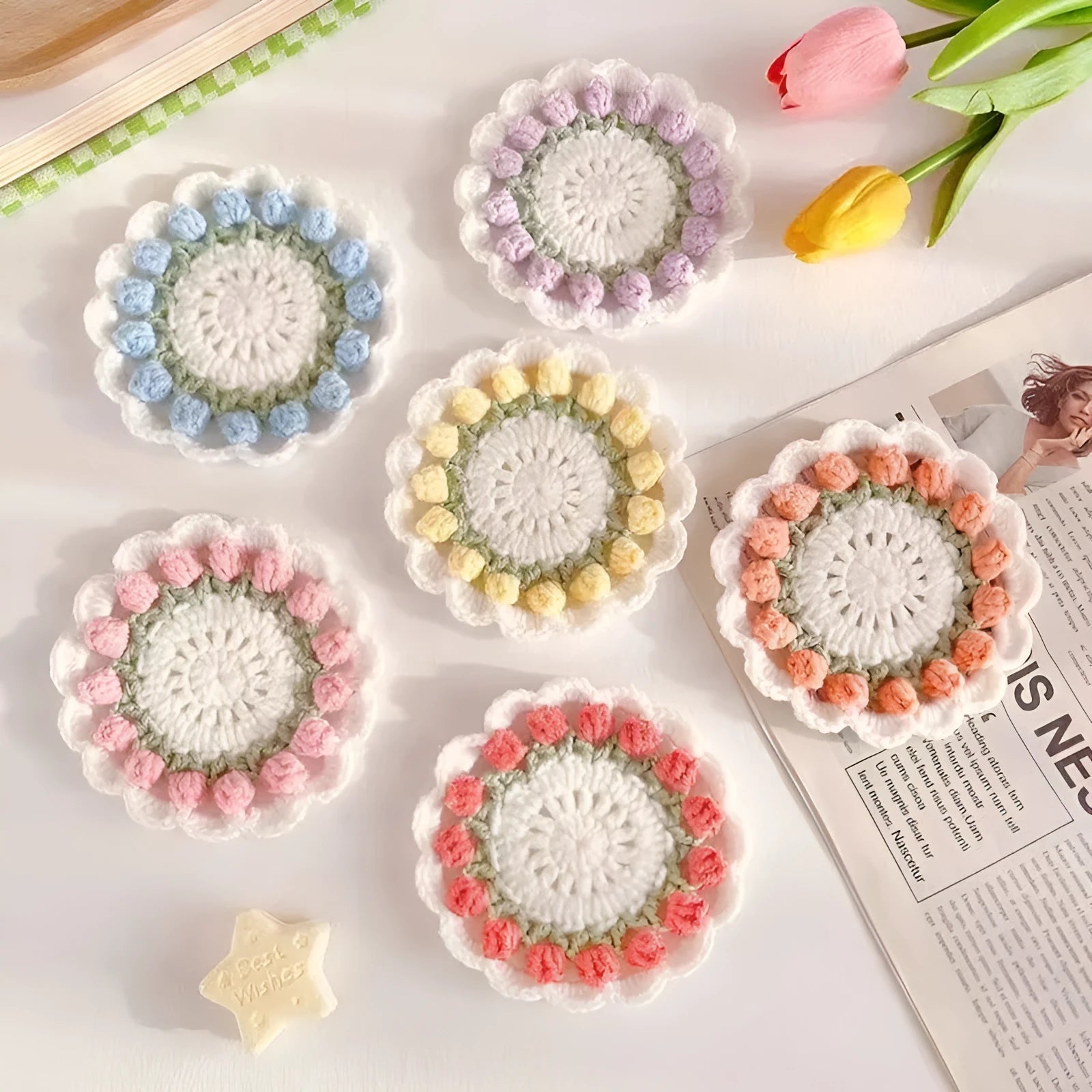 Handmade woven floral coaster in cotton and linen yarn with crochet hook construction