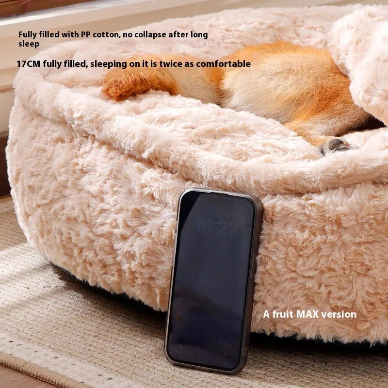 Round nest pet bed with a removable cover in a milk tea colour on a wooden floor