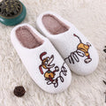 White fluffy slippers with cartoon pattern, rubber sole, and a toe holder design.