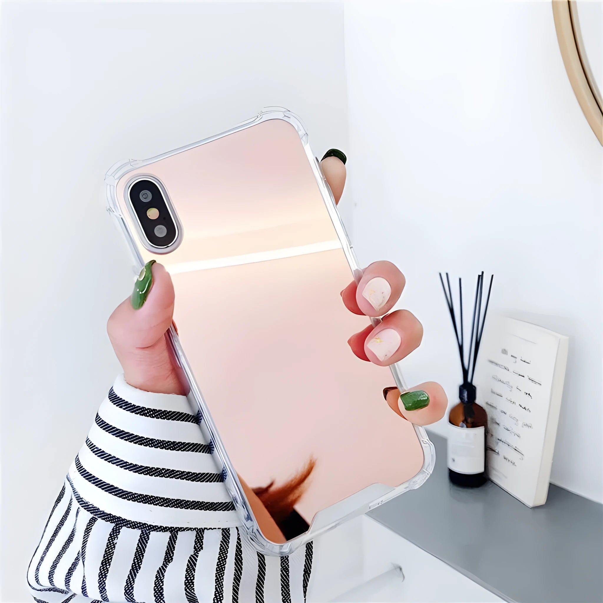 Mirror-finish TPU protective case for iPhone on a table.