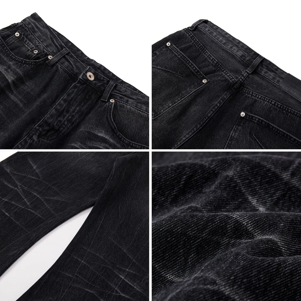 Black men's straight-leg jeans showing a cracked, washed denim finish on a plain background.