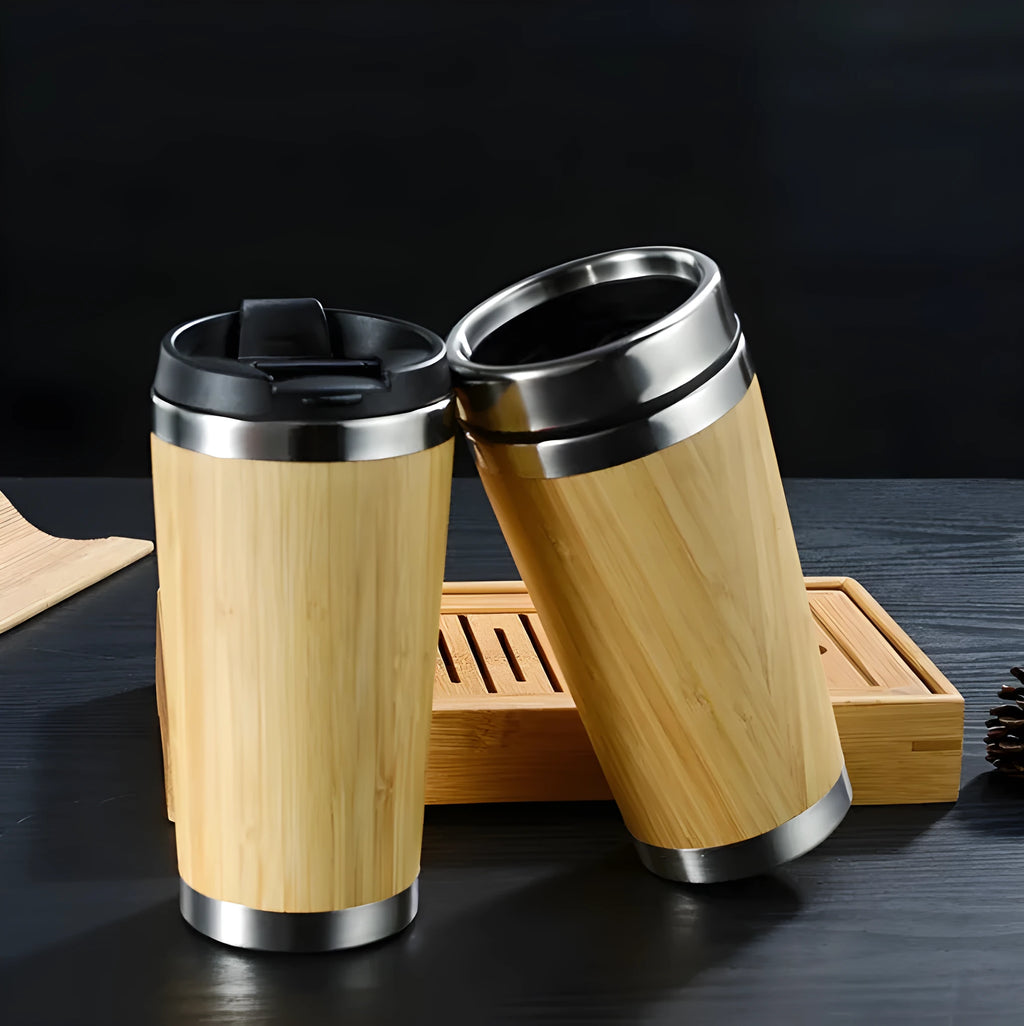 Bamboo and stainless steel insulated coffee cup with lid and foam pad, 420ml capacity.